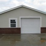 24'x32' garage with brick wainscot and dryvit application.
