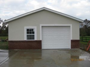 24'x32' garage with brick wainscot and dryvit application.