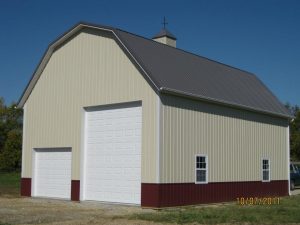 Steel two-toned garage with porch