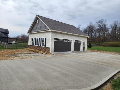 30'x36' building with 8/12 pitch and fiber cement siding! 3' stone wainscot accent on front with brow!