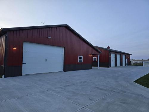 Fully finished interior garage with an 8'x8' glass overhead door