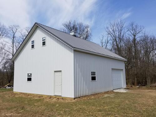 30'x40' storage building with bright white siding and 8/12 pitch in Oxford, Ohio!