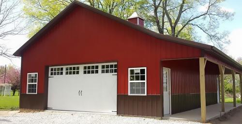 30'x48' pole building with carriage overlay garage doors and porch